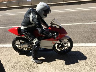 Lou on his Moto3 bike